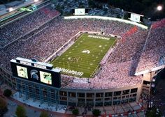 an aerial view of a football stadium at night