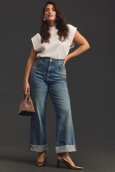 From holy-grail tees and perfectly fitted jeans to laidback dresses, PILCRO is on everyone’s most-wanted-wardrobe list. We have a new jean in town and it's all the rage. Meet Austyn, the perfect pair for dressing up or down, featuring a statement cuff and trendy wide-leg. u200b | The Austyn High-Rise Cuffed Wide-Leg Jeans by Pilcro in Blue, Women's, Size: 23, Cotton/Elastane/Lyocell at Anthropologie Wide Leg Jeans Outfit Summer Plus Size, Anthropology Womens Clothing, Classy Ripped Jeans Outfit, Size 10 Fashion For Women, Elevated Basics Plus Size, Anthropologie Clothing Outfits, Elegant Fall Fashion, Outfits For Size 12 Women Body Types, Teacher Style Plus Size