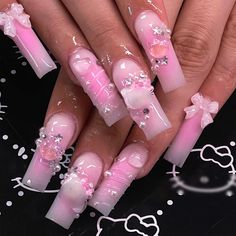 pink and white nail designs with bows on the tip of their nails, all done in acrylic