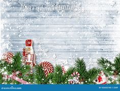 a christmas card with candy canes and snowflakes on the border, surrounded by evergreen branches