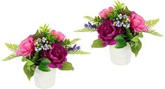 two white vases with flowers and greenery in them on a white background for decoration