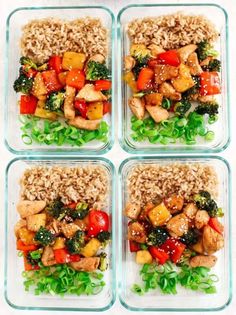 four glass containers filled with rice, chicken and veggies on top of each other