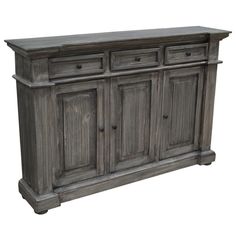 an old wooden sideboard with drawers and doors