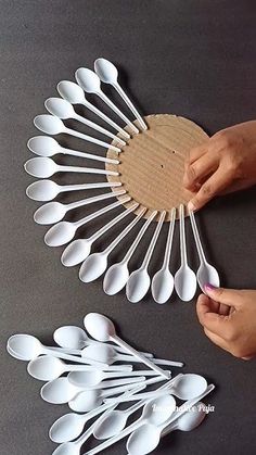 spoons are laid out on the table to be used as utensil holders