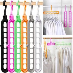 four different colored clothes hangers and one is hanging on a rail, the other two are