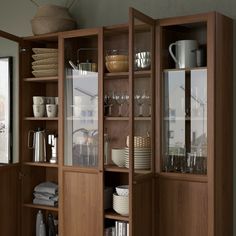 OXBERG panel/glass door, brown walnut effect, 153/4x755/8" - IKEA Bookcase With Glass Doors Office, Wall Cabinet For Glassware, Ikea Glass Display, Glass Cabinet Pantry, Buffet Billy Ikea, Billy Bookcase Display Cabinet, Pocket Pantry Doors, Blank Wall Space In Kitchen, Billy Oxberg Dining Room