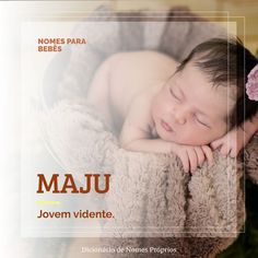 a baby sleeping in a basket with the words maju written on it's side