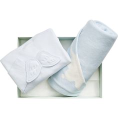 two baby swaddles in a white box with angel wings on the front and back