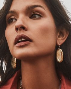 Our iconic silhouette gets a handcrafted touch in the Elle Vintage Gold Etch Frame Drop Earrings in Iridescent Abalone. Featuring an etched metal frame inspired by tooled leather saddles, these earrings are the bit of vintage-inspired charm your earring collection needs. These earrings are a part of Yellow Rose by Kendra Scott—a brand that celebrates ranch life with Kendra Scott staples alongside select curated jewelry pieces and accessories. Metal Vintage 23k Yellow Gold Over Brass Material Iri Abalone Jewelry, Short Pendant Necklace, Metal Etching, Earring Collection, Gold Cocktail Ring, Ranch Life, Gold Statement Necklace, Gold Cocktail, Gold Bracelet Cuff