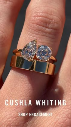 two engagement rings on top of each other with the words cushla whiting