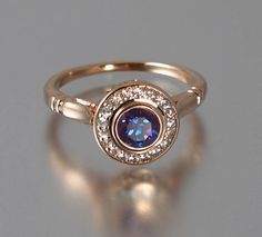 THE SECRET DELIGHT 14k rose gold Alexandrite engagement ring with diamond halo Gold Alexandrite Engagement Ring, Vintage Rose Gold, Alexandrite Engagement Ring, Ring With Diamond, Sparkly Things, Rose Gold Engagement, Bling Rings, Pretty Jewelry, Pretty Rings