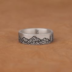 Mountains and Pine Trees Forest Art Ring Silver Ring, Minimalist 925 Sterling Silver Oxidized Engagement Ring, Nature Inspired Jewelry Gifts Made of 925 silver and handcrafted by hand, this ring is not only an accessory piece that complements your daily elegance, but also has details that will reflect your character and style. It is also a great gift to give to your loved ones on their special days. At SavisSilver, we always give importance to the satisfaction of our customers, we recommend you Minimalist Oxidized Open Ring Jewelry, Artistic Sterling Silver Rings For Anniversary, Etched Sterling Silver Open Ring, Etched Sterling Silver Open Ring Jewelry, Minimalist Etched Jewelry For Anniversary, Minimalist Nickel-free Engraved Ring, Artistic Engraved Sterling Silver Rings, Artistic Silver Round Rings, Nature-inspired Sterling Silver Ring Stamped 925