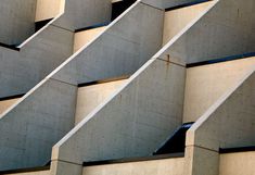 the side of a building that has concrete blocks on it