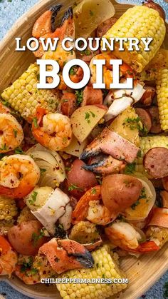 a bowl full of shrimp, corn and potatoes with the words low country boil over it