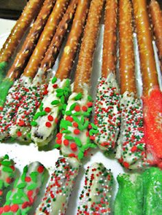 several different types of pretzels are arranged on a tray with sprinkles