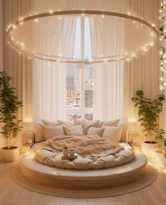 a circular bed with lights around it in a room filled with plants and potted plants