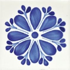 a blue and white tile with an abstract design