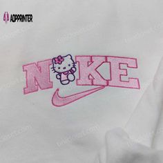 Introducing our Kitty Nike Embroidered Sweatshirt, a purrfect blend of style and comfort! This sweatshirt features a charming embroidered kitty Hello Kitty Nike Sweatshirt, Cute Sweater Designs Cricut, Nike Sweatshirts Embroidery, Nike Embroidered Sweatshirt, Nike Inspired, Perfect Girlfriend, Surprise Your Girlfriend, Embroidered Apparel, Sweatshirt Nike