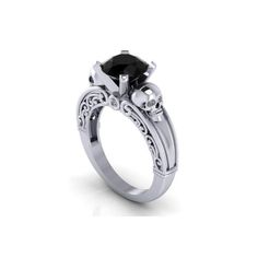 a black diamond engagement ring with intricate filigrees