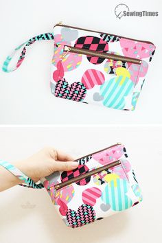 the zippered pouch is decorated with colorful hearts and stripes on white background, as if it were made from fabric