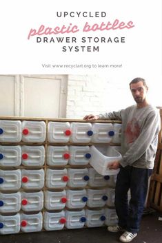 a man standing next to a large stack of plastic containers