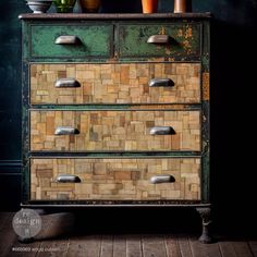 an old dresser with some plants on top