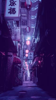 an alley way with signs and lights in the dark