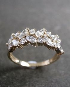 a diamond ring is shown on a table