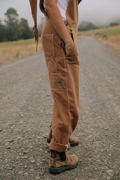 Retro oversized overalls. Baggy vintage inspired brown overalls. 1990's street style women. Grunge fashion ideas for winter and summer! Includes a front pocket and vintage brass buttons. Summer outfit ideas. Retro jumpsuit. Organic clothing. Sustainable fashion. Road less travelled. Baggy Overalls, Brass Buttons