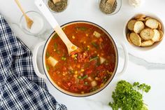 the soup is prepared and ready to be served in the pot, along with other ingredients