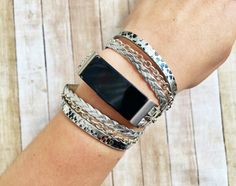 Luxury Boho Chic Fitbit Inspire Band Silver Snake Vegan Leather Strap Silver Chain Bracelet fro Fitbit Inspire HR Unisex Fitbit Jewelry Best PLEASE, MEASURE YOUR WRIST BEFORE ORDERING THE BAND. HOW TO MEASURE: Using a fabric tape measure, encircle the part of your wrist where you will be wearing your watch. If your wrist size is not included in the variation field but you really like my band, please, do not hesitate to contact me to discuss the options. I'm always happy to help you look and feel Handmade Watch Bands, Boho Chic Design, Smart Jewelry, Bracelet Boho, Silver Chain Bracelet, Leather Watch Bands, Fabric Tape, Boho Stil, Handmade Boho