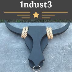 a bull's head with rope on it and the words industrial 3 above it