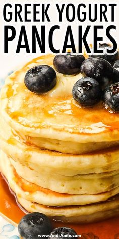 a stack of pancakes with blueberries on top and the words greek yogurt pancakes above it