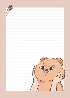 a teddy bear holding its head in front of a notepad