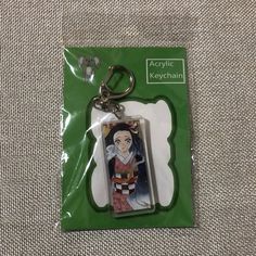 a key chain with an anime character on it