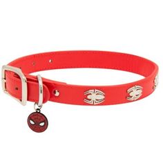 a red belt with a spiderman charm on the side and a round metal buckle