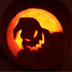 a pumpkin carved to look like a dog