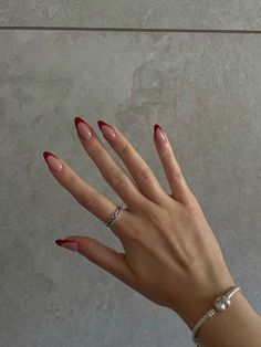 Clear Nails With Red Design, Red Acrylics Almond, Red French Tip Nails Almond With Rhinestones, Thick Red French Tip, Red Tip Nails Christmas, Red French Tips With Rhinestones, Red Gel X Nail Designs, Cherry Red French Nails, Short Red Tip Nails