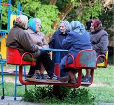 four people sitting on a park bench with the caption what do you think?