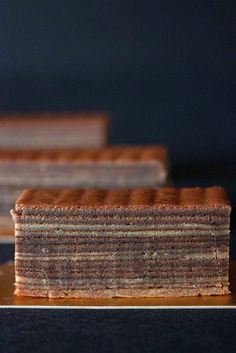 two slices of cake sitting on top of a table