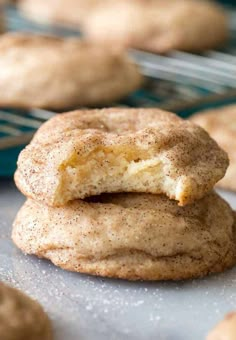 two cookies that are sitting on a cooling rack