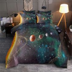 a bed with an image of the planets on it