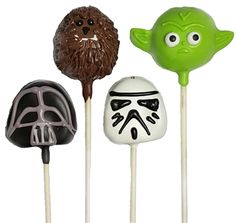 three star wars lollipops with faces on them