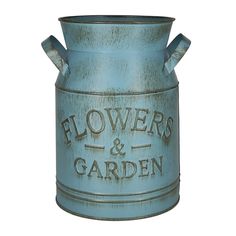 an old blue flower pot with the words flowers and garden on it's side