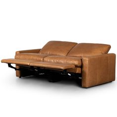 a brown leather couch with two recliners on it's back and one arm facing the camera