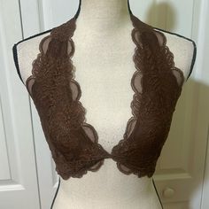 This Sultry Lace Bra Is Designed In A Halter Silhouette With Sweet Scallop Trim. Halter Neck Partially Lined 90% Nylon, 10% Spandex Hand Wash, Line Dry Imported Sheer Fitted Bra For Party, Party Sheer Fitted Bra, Elegant Fitted Bra With Lace Top, Sheer Low-cut Bra For Parties, Fitted Lace Camisole Bra, Lace Camisole Bra, Sheer Triangle Top Fitted Bra, Fitted Sheer Triangle Top Bra, Fitted Triangle Top Bra For Night Out