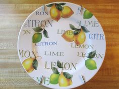 a plate with lemons painted on it