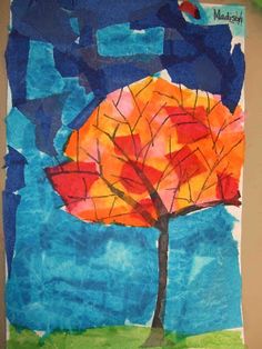 an art project made with colored paper and watercolors