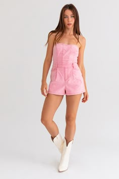 An exclusive, limited edition denim tube style romper in a light pink shade. Model sizing: True to size but if you are in-between sizes, we recommend sizing up. Model is wearing a size small. Height: 5'8" Bust: 32A Waist: 24" Hips: 34" Fabric content: 70% Cotton, 27% Polyester, 3% Spandex Trendy Strapless Jumpsuit With Pockets, Casual Strapless Denim Jumpsuit With Pockets, Strapless Denim Jumpsuit With Pockets For Summer, Chic Short Length Tube Top For Spring, Chic Spring Tube Top, Trendy High Waist Strapless Jumpsuit With Pockets, Trendy Strapless High Waist Jumpsuit With Pockets, Casual Strapless Denim Jumpsuit For Spring, Trendy Strapless Jumpsuit With Pockets For Summer