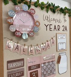 a bulletin board with a clock and calendars hanging on it's side,